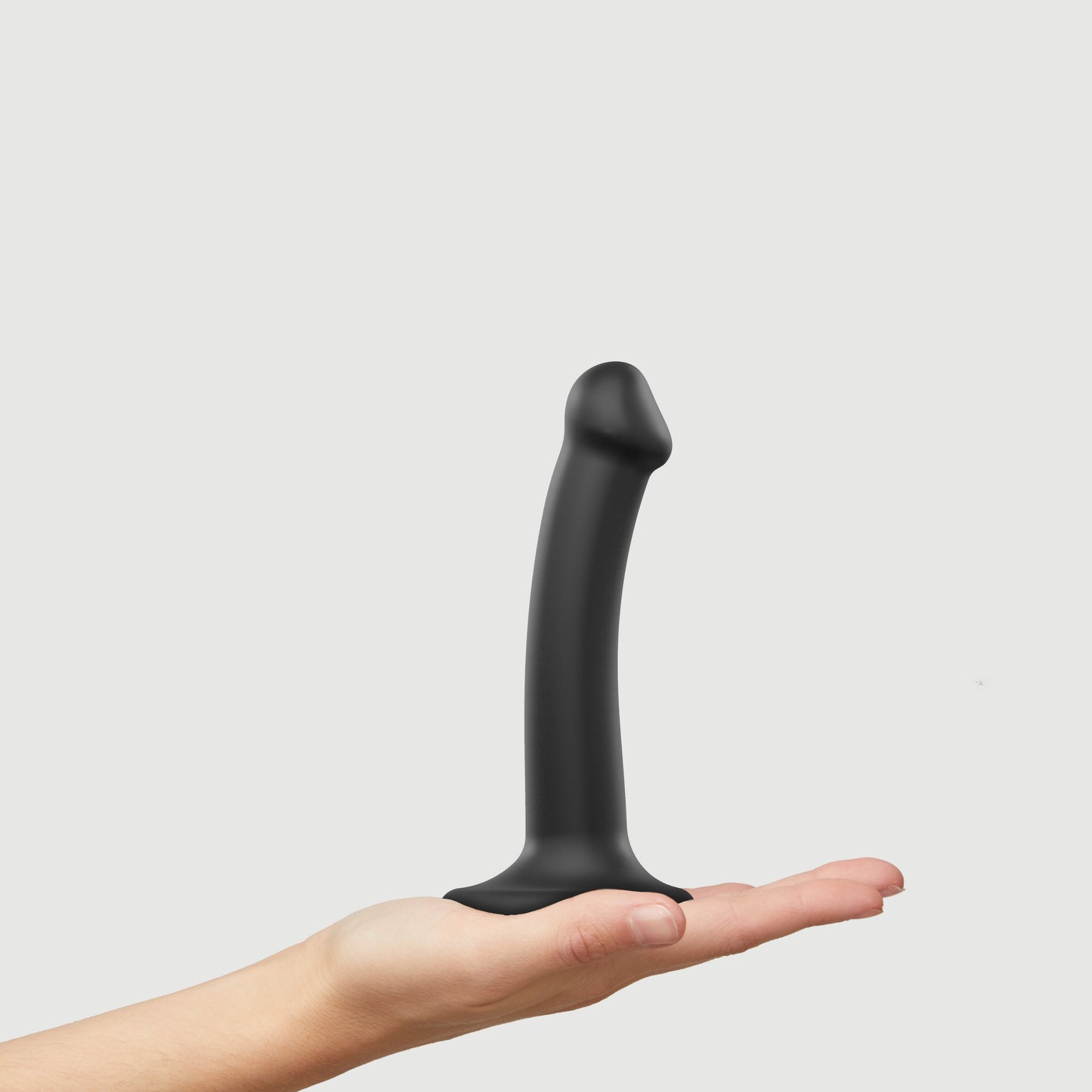 Bendable dual-density strap-on dildo