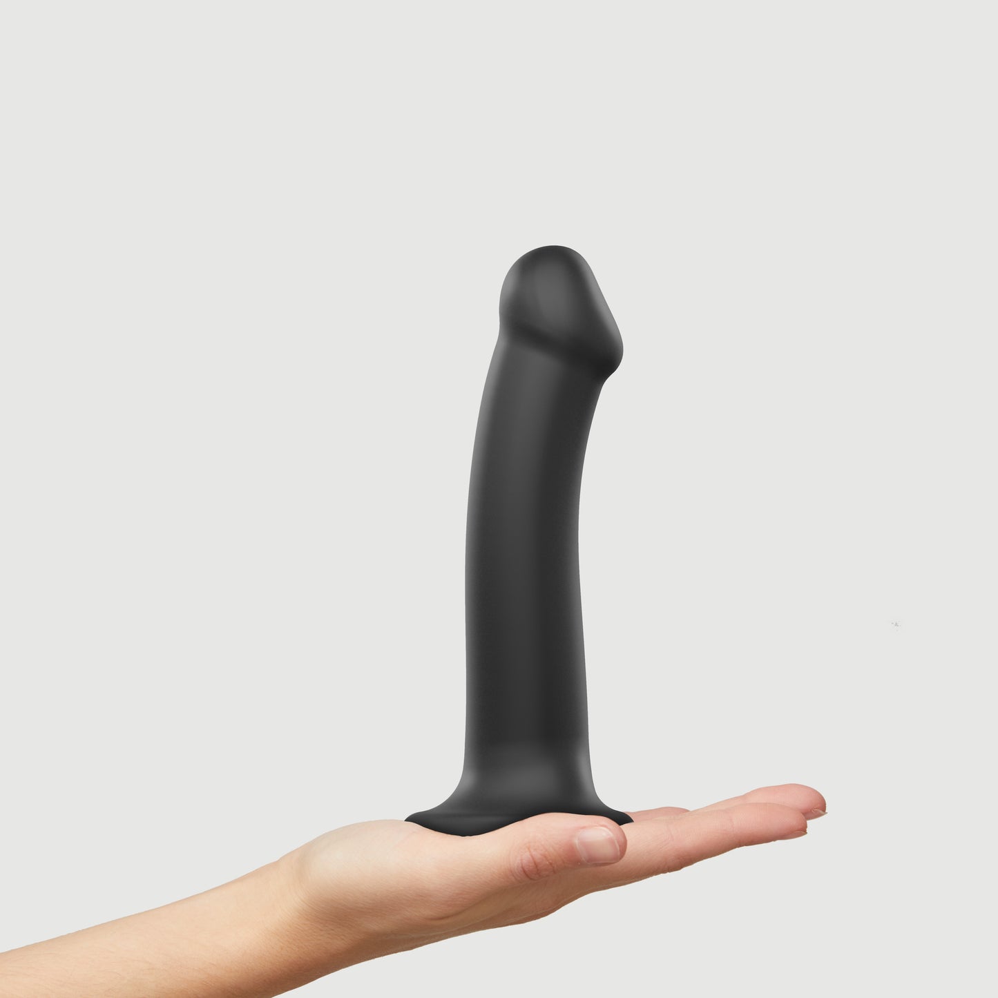 Bendable dual-density strap-on dildo
