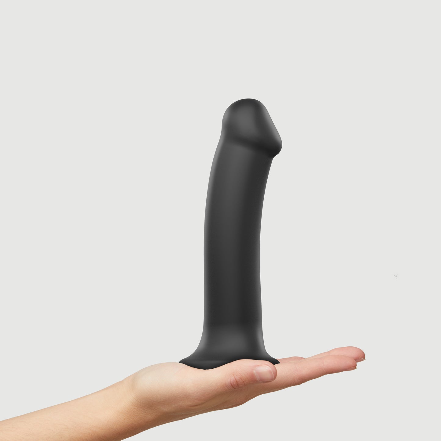 Bendable dual-density strap-on dildo