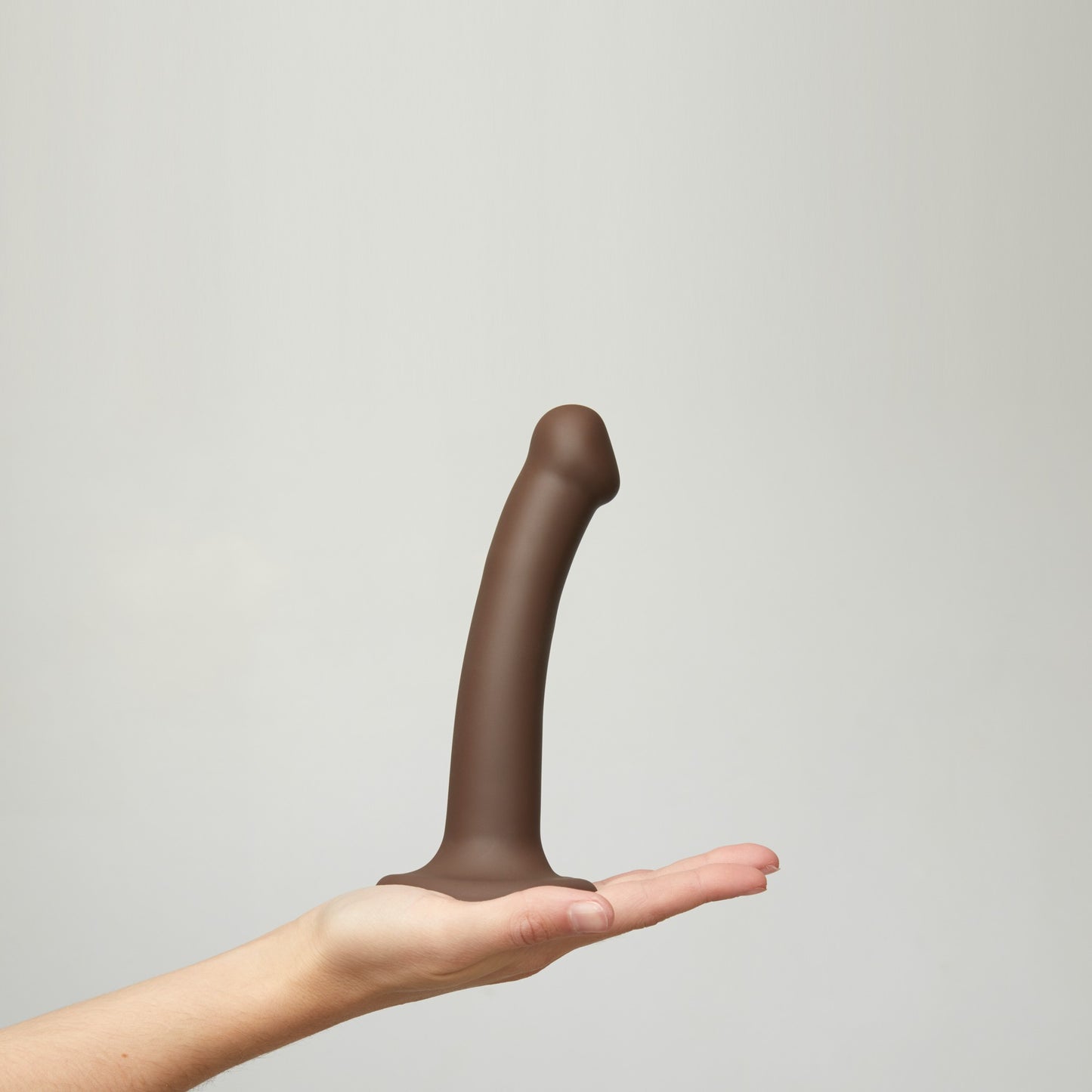 Bendable dual-density strap-on dildo